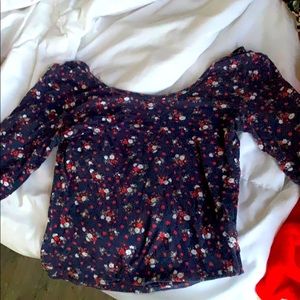 Adorable navy blue top with flower design